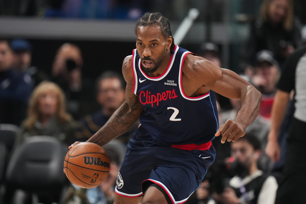Los Angeles Clippers forward Kawhi Leonard (2) makes his way down the court during the first half of an NBA basketball game against the Golden State Warriors Monday, Jan. 5, 2026, in Inglewood, Calif. (AP Photo/Jae C. Hong)