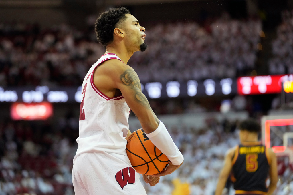 Wisconsin guard Nick Boyd (2) reacts to taking the lead against Southern California during the first half of an NCAA college basketball game Sunday, Jan. 25, 2026, in Madison, Wis. (AP Photo/Kayla Wolf)