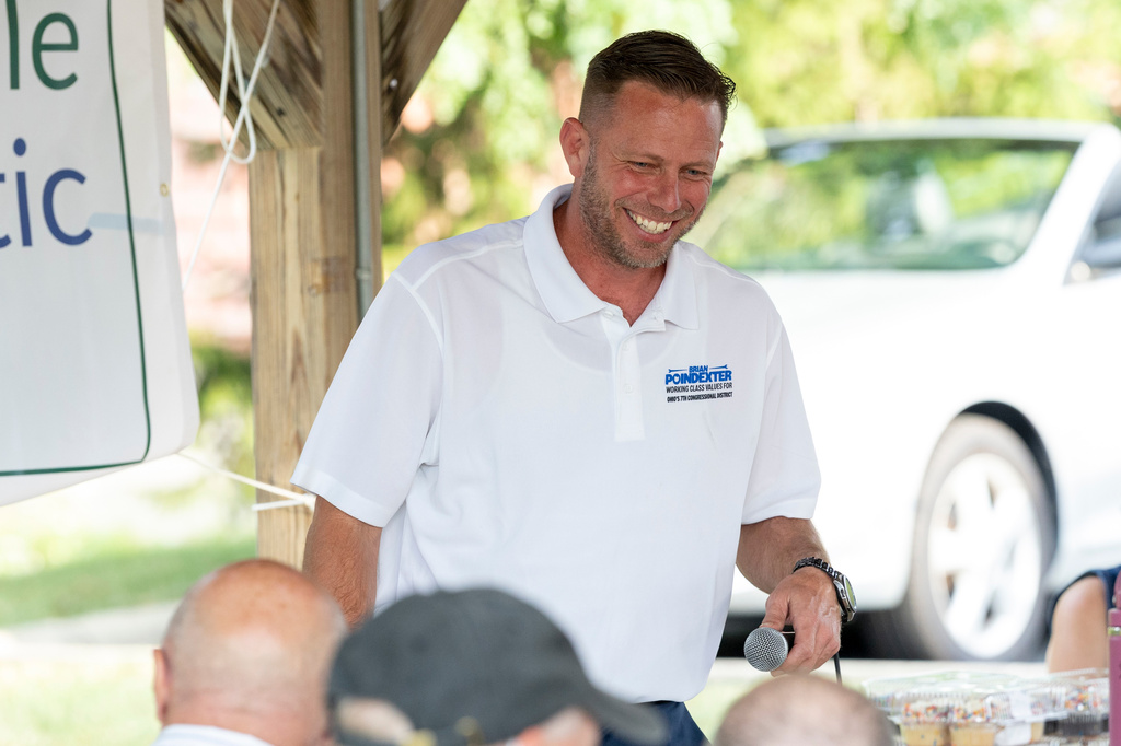 Brian Poindexter, Democratic nominee for Ohio's 7th congressional district, speaks to attendees at the Strongsville Democratic Club meeting, Wednesday, Aug. 5, 2026, in Strongsville, Ohio. (AP Photo/Nate Manley)