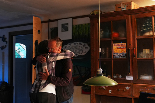 Mary E. Brunkow and her husband Ross Colquhoun embrace while celebrating her winning a Nobel Prize in medicine for part of her work on peripheral immune tolerance, in Seattle, Monday, Oct. 6, 2025. (AP Photo/Lindsey Wasson) Mary E. Brunkow and her husband Ross Colquhoun embrace while celebrating her winning a Nobel Prize in medicine for part of her work on peripheral immune tolerance, in Seattle, Monday, Oct. 6, 2025. (AP Photo/Lindsey Wasson)