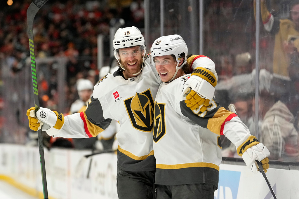 Vegas Golden Knights right wing Mitch Marner, right, celebrates his goal with defenseman Noah Hanifin during the second period in Game 3 of a second-round NHL hockey Stanley Cup playoff series against the Anaheim Ducks, Friday, May 8, 2026, in Anaheim, Calif. (AP Photo/Mark J. Terrill)