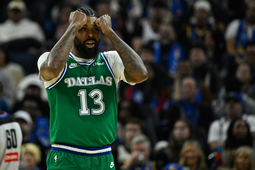 Dallas Mavericks forward Naji Marshall reacts against the Golden State Warriors during the first half of an NBA basketball game, Thursday, Dec. 25, 2025, in San Francisco. (AP Photo/Eakin Howard)