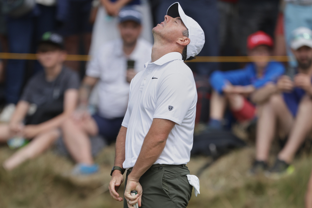 Rory McIlroy of Northern Ireland reacts after missing a putt on the 6th green during the third day of the British Open Golf championships at Royal Birkdale golf club, in Southport, England, Saturday, July 18, 2026. (AP Photo/Peter Morrison)