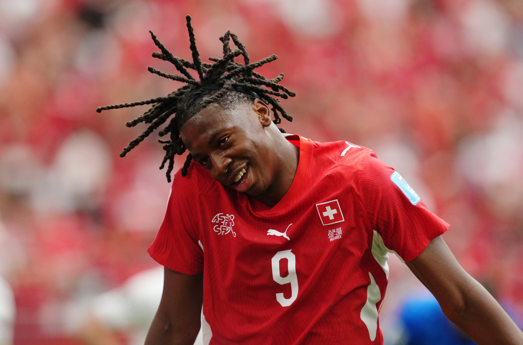 Switzerland's Johan Manzambi (9) celebrates scoring their second goal during the World Cup Group B soccer match between Switzerland and Canada in Vancouver, British Columbia, Wednesday, June 24, 2026. (Ethan Cairns/The Canadian Press via AP)