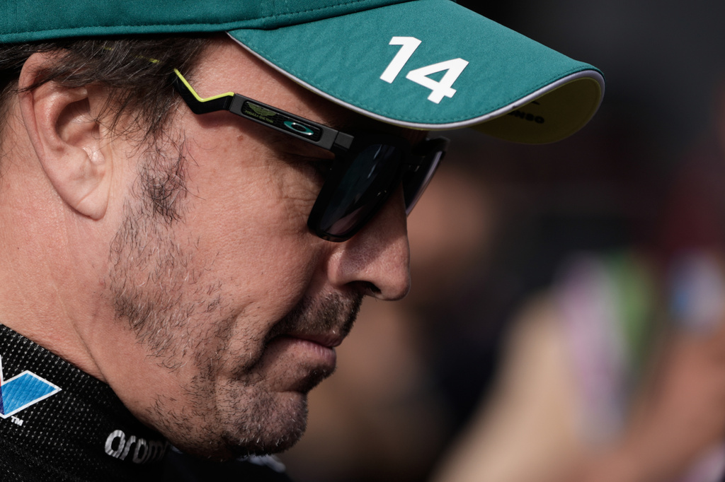 Aston Martin driver Fernando Alonso of Spain walks through the paddock prior to the qualifying session for the Azerbaijan F1 Grand Prix, in Baku, Azerbaijan, Friday, Sept. 25, 2026. (AP Photo/Pavel Bednyakov)