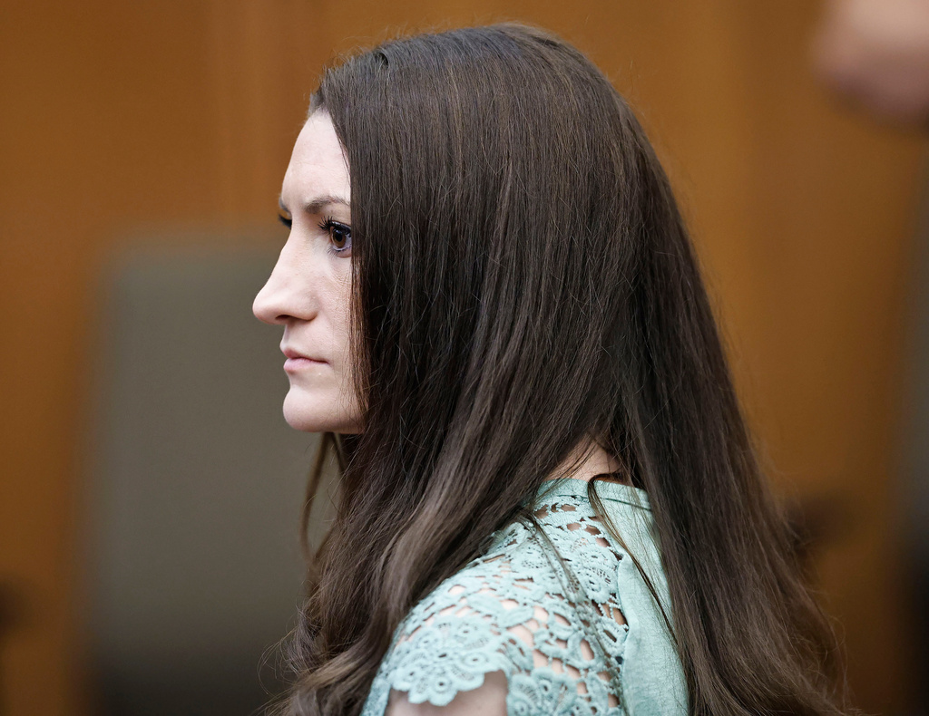Lindsay Clancy watches jurors as they enter the courtroom to start their second day of deliberations in her murder trial at Plymouth Superior Court on Friday, Aug. 28, 2026 in Plymouth Mass. (Greg Derr/The Patriot Ledger via AP, Pool)