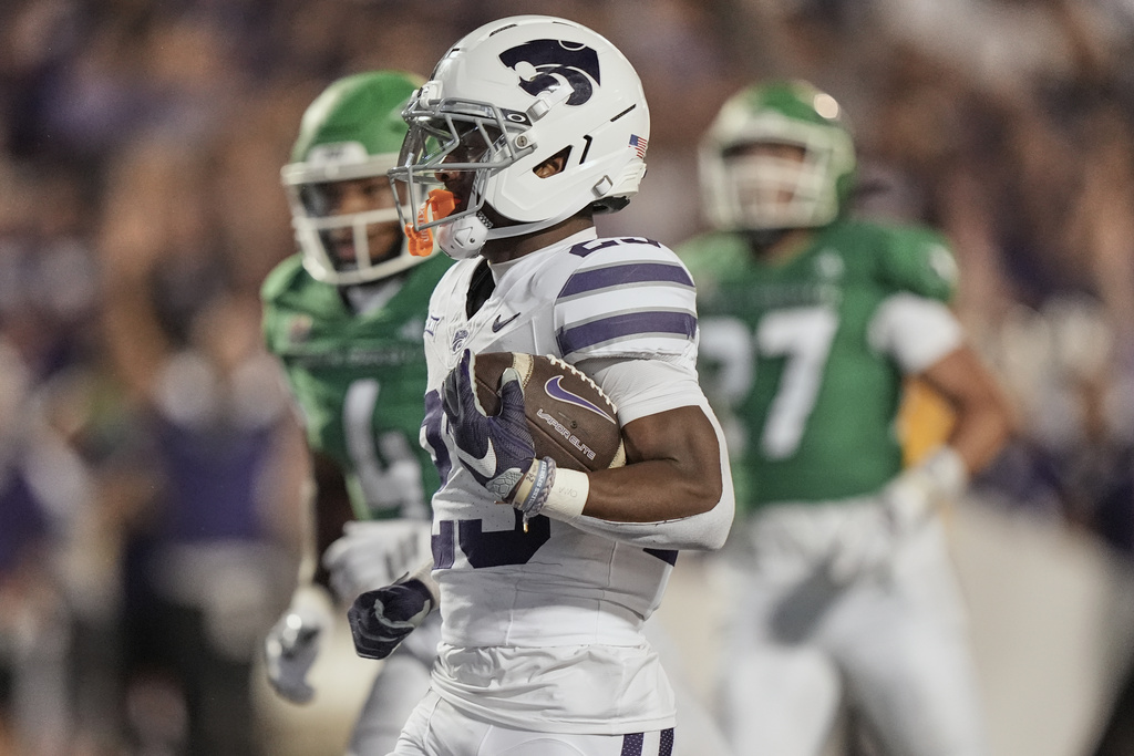 Kansas State running back DeVon Rice runs the ball to score a touchdown during the second half of an NCAA college football game against North Dakota, Saturday, Aug. 30, 2025, in Manhattan, Kan. (AP Photo/Charlie Riedel)