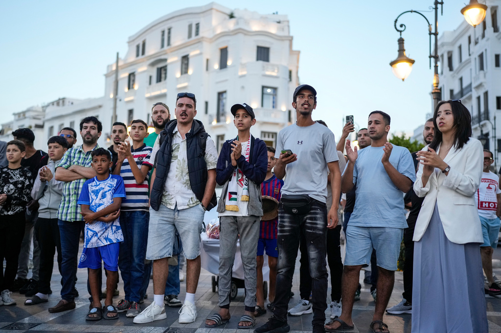 People take part in a youth led protest calling for education and healthcare reforms, in Tangier, Morocco, Saturday, Oct. 18, 2025. (AP Photo/Mosa'ab Elshamy)