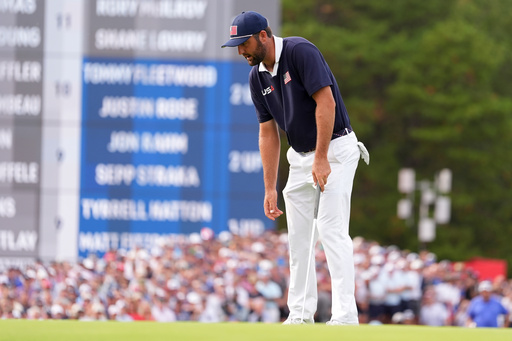 United States' Scottie Scheffler reacts after missing a putt on the 11th hole at Bethpage Black golf course during the Ryder Cup golf tournament, Saturday, Sept. 27, 2025, in Farmingdale, N.Y. (AP Photo/Lindsey Wasson) United States' Scottie Scheffler reacts after missing a putt on the 11th hole at Bethpage Black golf course during the Ryder Cup golf tournament, Saturday, Sept. 27, 2025, in Farmingdale, N.Y. (AP Photo/Lindsey Wasson)