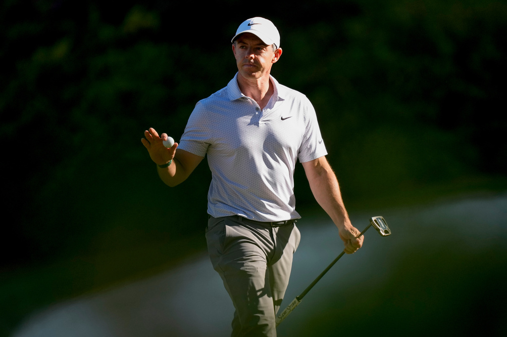 Rory McIlroy, of Northern Ireland, waves after his putt on the 13th hole during the second round of the Masters golf tournament at the Augusta National Golf Club, Friday, April 10, 2026, in Augusta, Ga. (AP Photo/Matt Slocum)