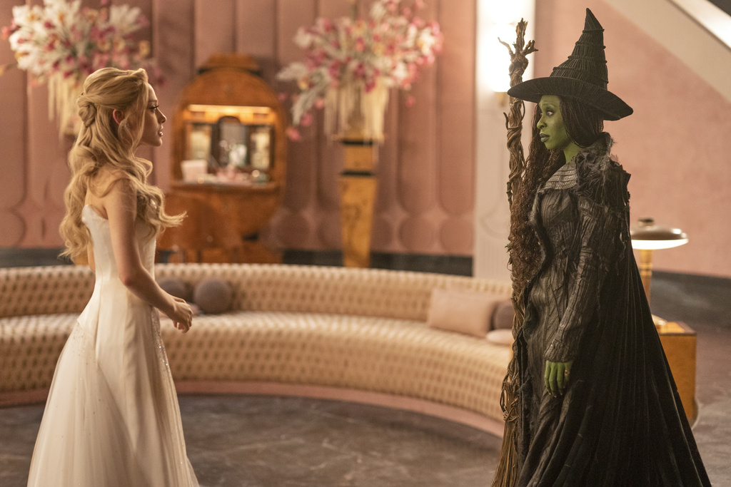 This image released by Universal Pictures shows Ariana Grande, left, and Cynthia Erivo in a scene from "Wicked: For Good." (Universal Pictures via AP)
