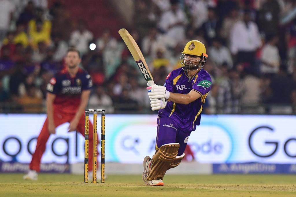 Kolkata Knight Riders' Rinku Singh plays a shot during the Indian Premier League cricket match between Royal Challengers Bengaluru and Kolkata Knight Riders in Raipur, India, Wednesday, May 13, 2026. (AP Photo/Abhijit Addya)