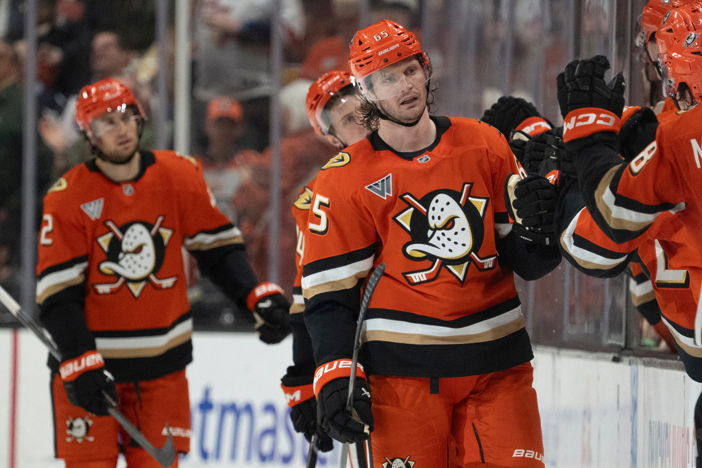 Anaheim Ducks defenseman Jacob Trouba celebrates his goal with the bench during the second period of an NHL hockey game against the Winnipeg Jets, Friday, Feb. 27, 2026, in Anaheim, Calif. (AP Photo/Kyusung Gong)