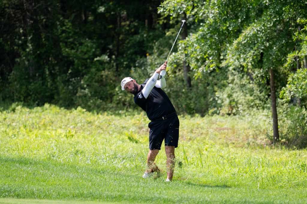 Captain Jon Rahm, of Legion XIII, hits on the 13th hole during the final round of LIV Golf Bedminster at Trump National Golf Club, Sunday, Aug. 9, 2026, in Bedminster, N.J. (Montana Pritchard/LIV Golf via AP)