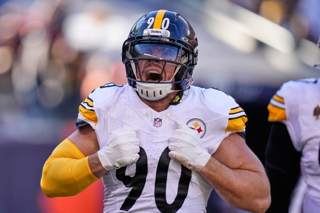 Pittsburgh Steelers linebacker T.J. Watt (90) celebrates after sacking Chicago Bears quarterback Caleb Williams, and forcing a fumble, which led to a touchdown, during the first half of an NFL football game Sunday, Nov. 23, 2025, in Chicago. (AP Photo/Erin Hooley)