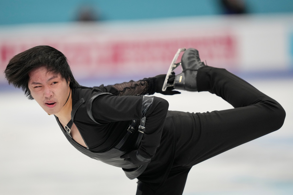Kao Miura of Japan competes in the Men Short Program of the ISU Four Continents Figure Skating Championships in Beijing, China, Saturday, Jan. 24, 2026. (AP Photo/Vincent Thian)