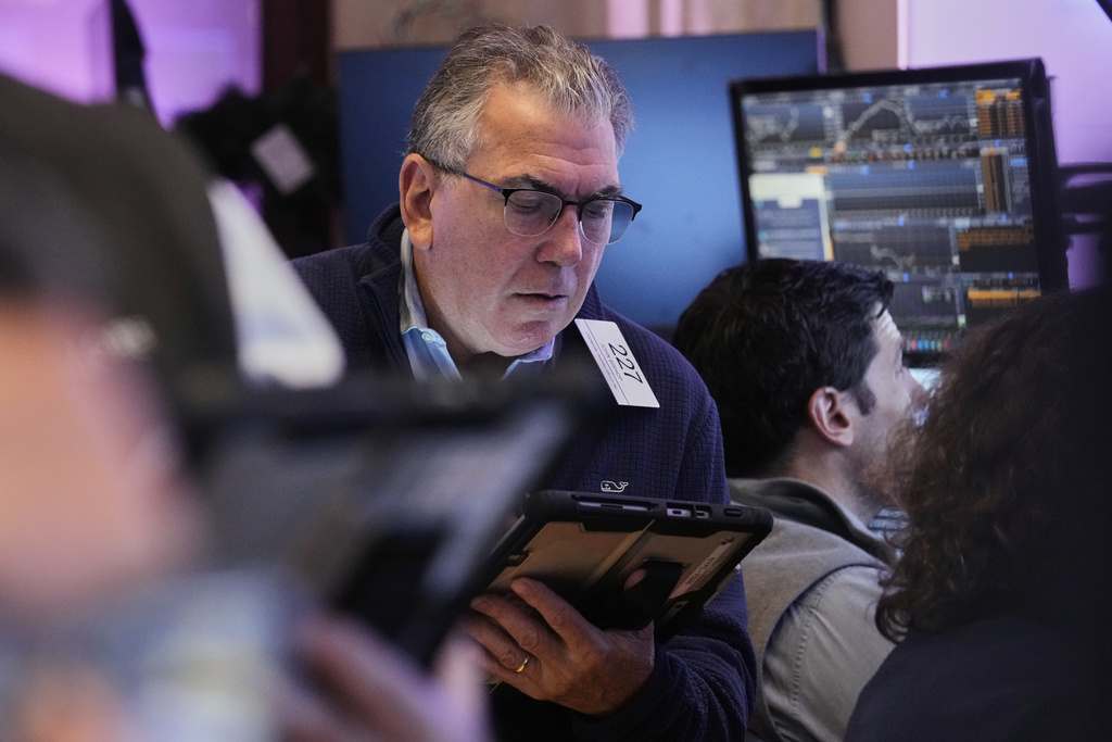 Trader John Bishop works on the floor of the New York Stock Exchange, Wednesday, Sept. 10, 2025. (AP Photo/Richard Drew)