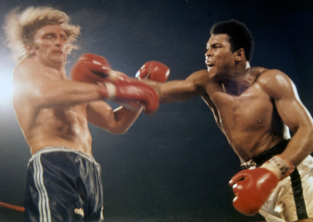 FILE - American Heavyweight Champion Muhammad Ali, right, launches an attack on Joe Bugner, British and European Heavyweight Champion, during their 12 round Heavyweight fight in Los Vegas, Nevada, on Feb. 14, 1973. (AP Photo, file)