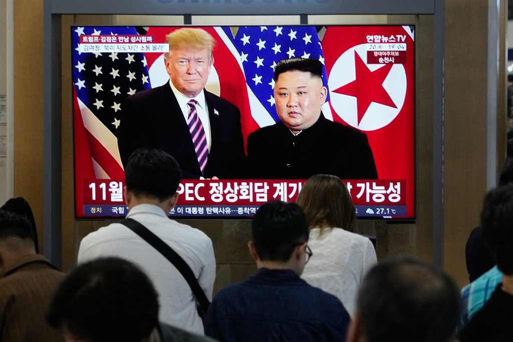 A TV screen shows a file image of North Korean leader Kim Jong Un and U.S. President Donald Trump during a news program at Seoul Railway Station in Seoul, South Korea, Thursday, Aug. 20, 2026. (AP Photo/Ahn Young-joon)