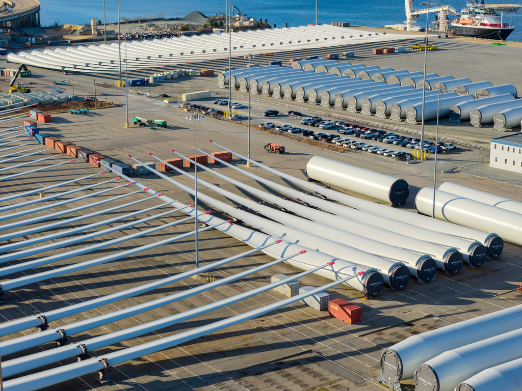 FILE - Wind turbine bases, generators and blades sit at The Portsmouth Marine terminal that is the staging area for Dominion Energy Virginia, which is developing Coastal Virginia Offshore Wind, Dec. 22, 2025, in Portsmouth, Va. (AP Photo/Steve Helber, File)