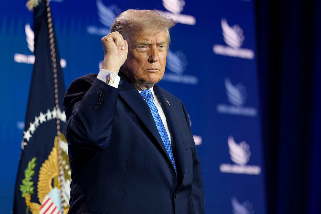 President Donald Trump addresses the crowd as he departs after speaking at the Faith & Freedom Coalition's policy conference at the Washington Hilton, Friday, June 26, 2026, in Washington. (AP Photo/Julia Demaree Nikhinson)