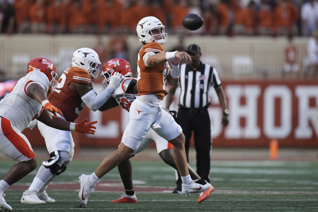 Texas quarterback Arch Manning (16) passes on the run against Sam Houston State during the first half of an NCAA college football game in Austin, Texas, Saturday, Sept. 20, 2025. (AP Photo/Eric Gay)