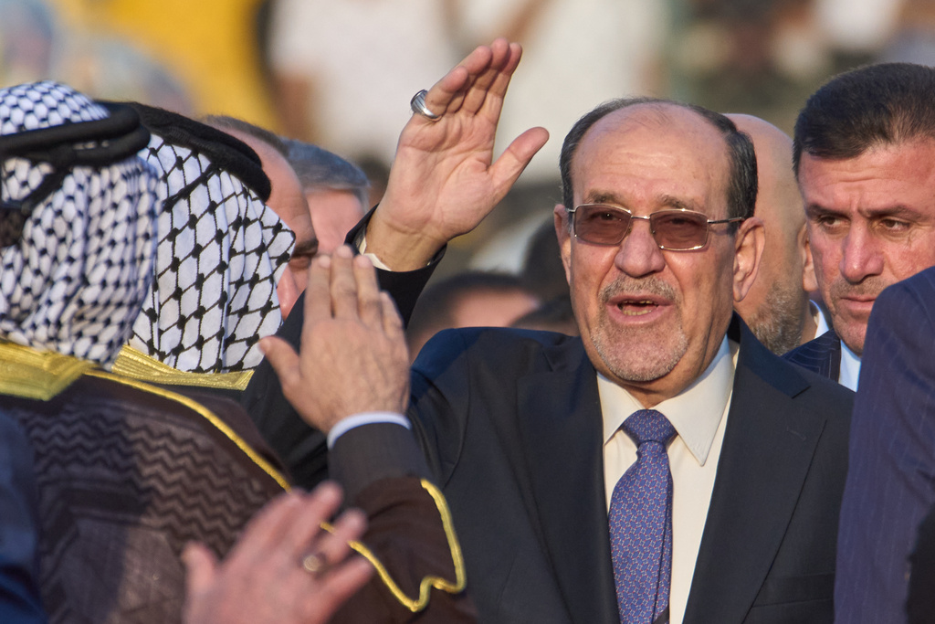 FILE - Former Iraqi Prime Minister Nouri al-Maliki arrives to his political block campaign rally before the parliamentary elections in Baghdad, Iraq, Friday, Nov. 7, 2025. (AP Photo/Hadi Mizban, File)