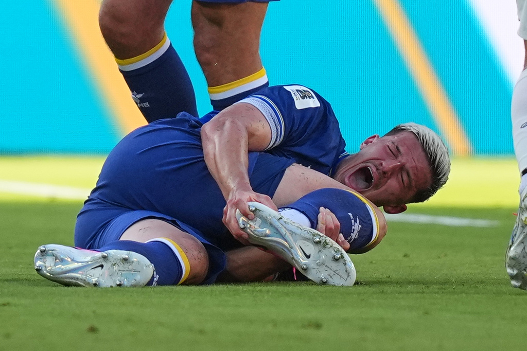 Bosnia's Tarik Muharemovic (4) reacts after a tackle form United States' Folarin Balogun (20) during the World Cup round of 32 soccer match between the United States and Bosnia in Santa Clara, Calif., near San Francisco, Wednesday, July 1, 2026. (AP Photo/Julio Cortez)