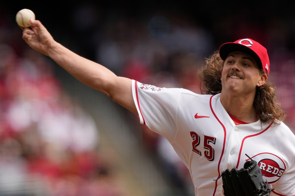 Cincinnati Reds pitcher Rhett Lowder throws during the first inning of a baseball game between the Cincinnati Reds and the Boston Red Sox in Cincinnati, Sunday, March 29, 2026. (AP Photo/Carolyn Kaster)