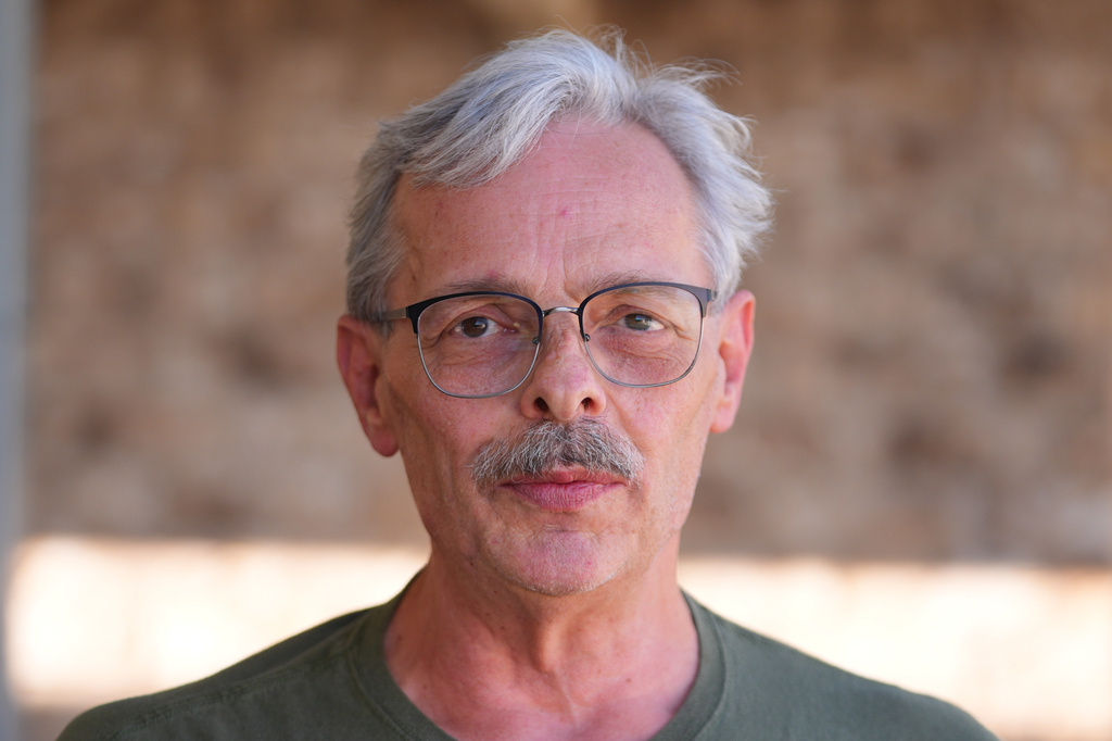 Ed Westrick, 59, pauses while talking at his rural home near Commerce, Texas, Friday, Sept. 18, 2026. (AP Photo/LM Otero)