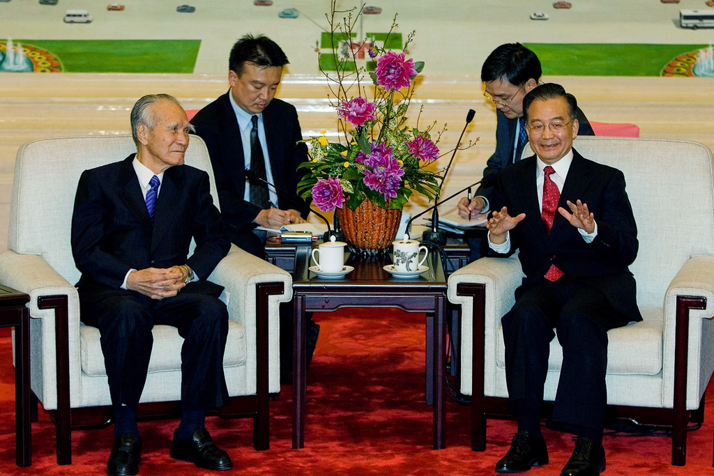 FILE - Chinese Premier Wen Jiabao, right, meets former Japanese Prime Minister Murayama Tomiichi before a banquet to commemorate the 35th anniversary of the normalization of Sino-Japanese relations at the Great Hall of the People on Sept. 27, 2007, in Beijing. (Andrew Wong/Pool Photo via AP, File)