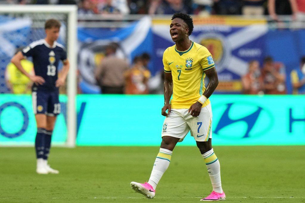 Brazil's Vinicius Junior (7) celebrates after scoring their opening goal during the World Cup Group C soccer match between Scotland and Brazil in Miami Gardens, Fla., Wednesday, June 24, 2026. (AP Photo/Lynne Sladky)