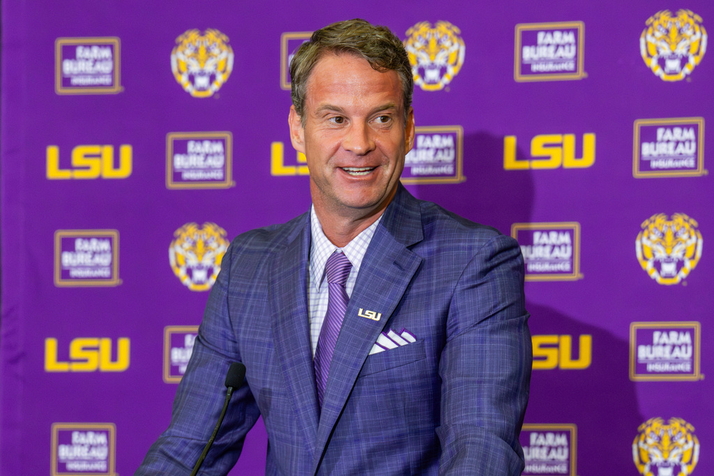 FILE - LSU's new head football coach Lane Kiffin gives an opening statement at an introductory news conference, Dec. 1, 2025, in Baton Rouge, La. (Michael Johnson/The Advocate via AP, File)