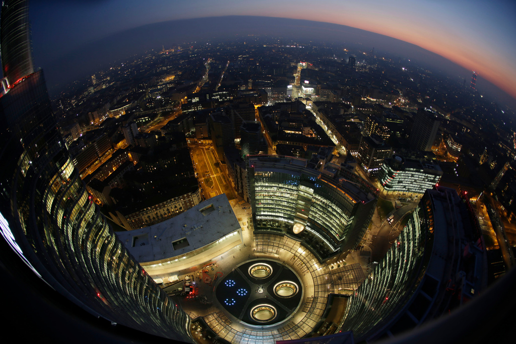 FILE - This photo shows Milan's City Life district at dusk on Jan. 7, 2015. (AP Photo/Luca Bruno, File)