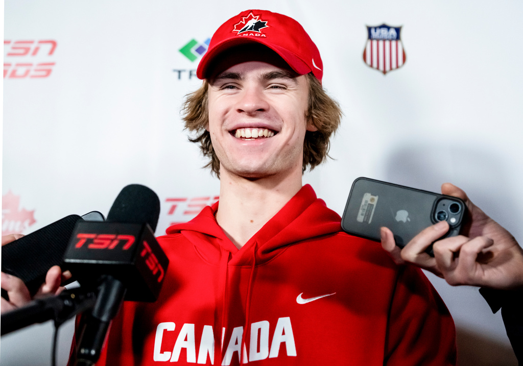 Canada's Gavin McKenna speaks to media following a practice during the IIHF World Junior Championship, in Minneapolis on Tuesday, Dec. 30, 2025. (Christopher Katsarov/The Canadian Press via AP)