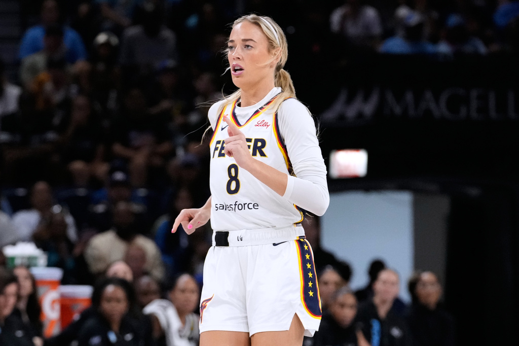 Indiana Fever guard Sophie Cunningham runs on the court during the first half of a WNBA basketball game against the Chicago Sky, Sunday, Aug. 23, 2026, in Chicago. (AP Photo/Nam Y. Huh)