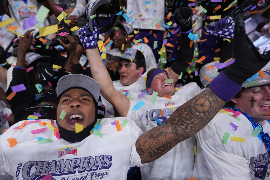 TCU players celebrate their win over Southern California in the Alamo Bowl NCAA college football game in San Antonio, Tuesday, Dec. 30, 2025. (AP Photo/Eric Gay)