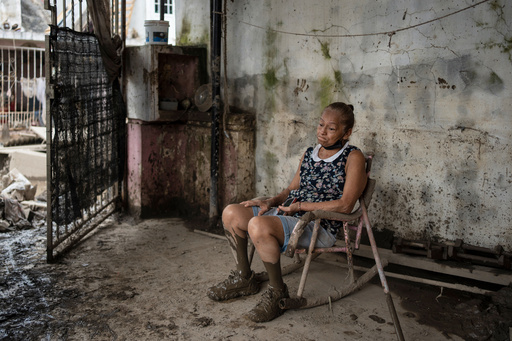 Angela Perez sits on a chair in her house in Poza Rica, Veracruz state, Mexico, Wednesday, Oct. 15, 2025, after deadly floods and torrential rain. (AP Photo/Felix Marquez) Angela Perez sits on a chair in her house in Poza Rica, Veracruz state, Mexico, Wednesday, Oct. 15, 2025, after deadly floods and torrential rain. (AP Photo/Felix Marquez)