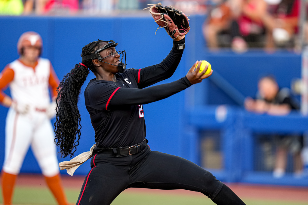 Texas Tech pitcher NiJaree Canady (24) throws during Game 1 of the NCAA Women's College World Series softball championship series against Texas on Wednesday, June 3, 2026, in Oklahoma City. (Aaron E. Martinez/Austin American-Statesman via AP)