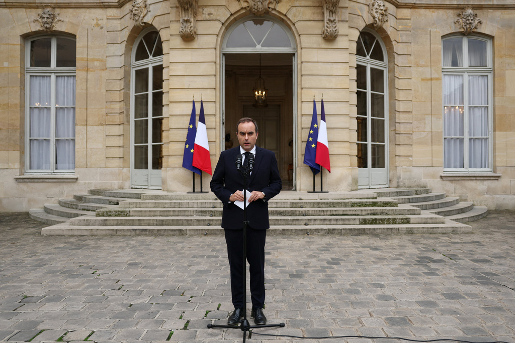 French outgoing Prime Minister Sebastien Lecornu, who resigned just a day after naming his government, delivers his statement at the Hotel Matignon in Paris, Monday, Oct. 6, 2025. (Stephane Mahe/Pool via AP)