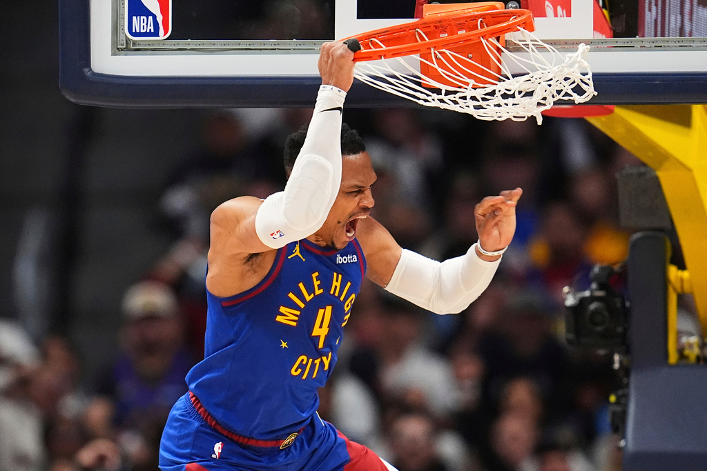 FILE - Denver Nuggets guard Russell Westbrook reacts after dunking the ball for a basket during the second half of Game 1 of an NBA first-round playoff series against the Los Angeles Clippers, Saturday, April 19, 2025, in Denver. (AP Photo/David Zalubowski, File)