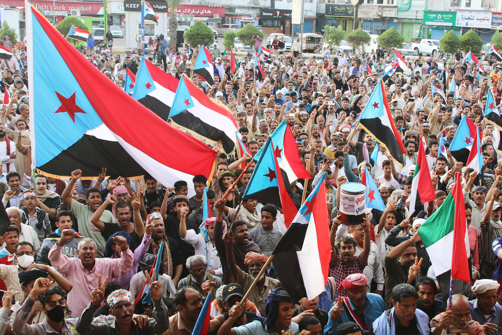 Supporters of the Southern Transitional Council (STC), a coalition of separatist groups seeking to restore the state of South Yemen, hold South Yemen flags during a rally, in Aden, Yemen, Friday, Jan. 2, 2026. (AP Photo)