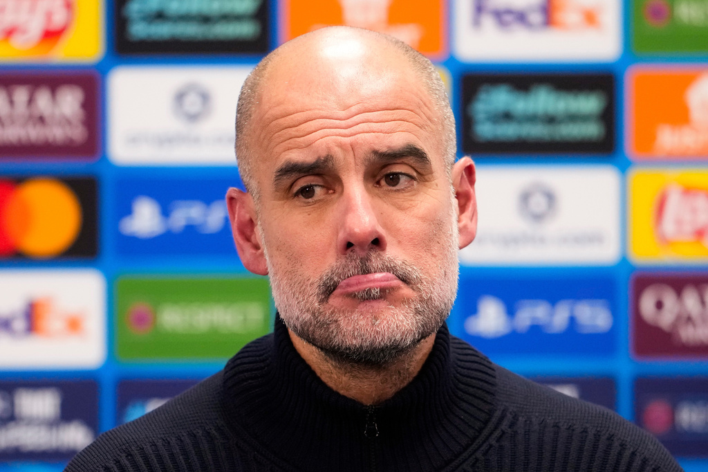 Manchester City coach Pep Guardiola attends a press conference after the Champions League soccer match between Bodo/Glimt and Manchester City in Bodo, Norway, Tuesday, Jan. 20, 2026. (Fredrik Varfjell/NTB via AP)