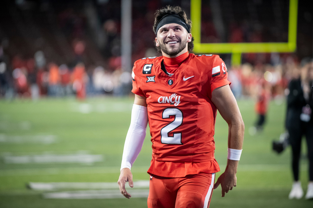 FILE - Cincinnati quarterback Brendan Sorsby (2) walks off the field after a NCAA college football game against Baylor, Oct. 25, 2025, in Cincinnati. (AP Photo/Tanner Pearson, File)
