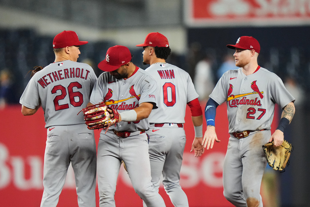 St. Louis Cardinals' José Fermín celebrates with JJ Wetherholt (26), Masyn Winn (0) and Nathan Church (27) after a baseball game against the New York Yankees Wednesday, Aug. 5, 2026, in New York. (AP Photo/Frank Franklin II)