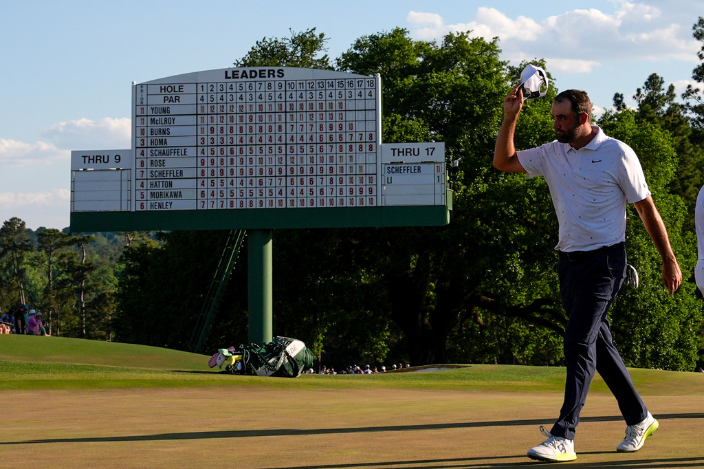 Scottie Scheffler finishes his final round of the Masters golf tournament at the Augusta National Golf Club, Sunday, April 12, 2026, in Augusta, Ga. (AP Photo/David J. Phillip)