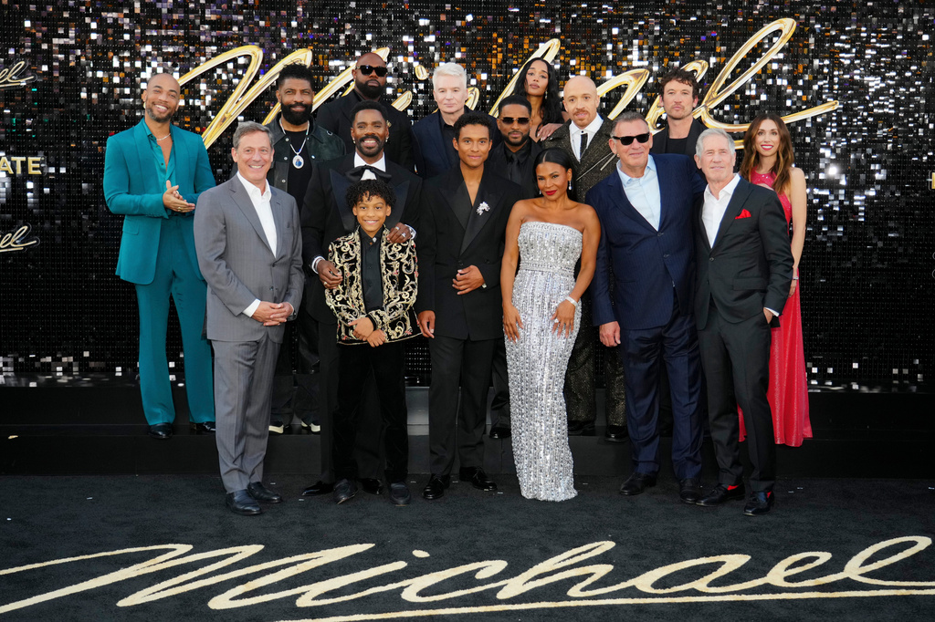 Kendrick Sampson, from left, Adam Fogelson, Chairman, Lionsgate Motion Picture Group, Deon Cole, Colman Domingo, Juliano Valdi, Antoine Fuqua, Mike Myers, Jaafar Jackson, Larenz Tate, Laura Harrier, Nia Long, KeiLyn Durrel Jones, Graham King, Miles Teller and Jon Feltheimer arrive sat the premiere of "Michael" on Monday, April 20, 2026, at the Dolby Theatre in Los Angeles. (Photo by Jordan Strauss/Invision/AP)