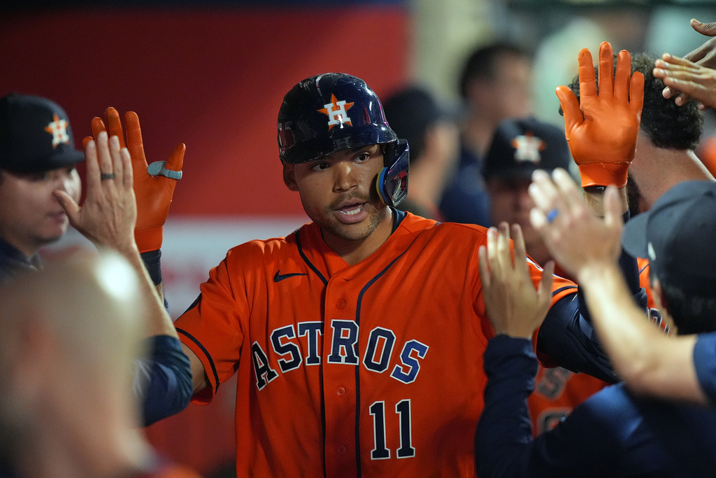 Houston Astros Cam Smith celebrates his game-tying solo home run against the Los Angeles Angels during the eighth inning of a baseball game, Wednesday, June 10, 2026, in Anaheim, Calif. (AP Photo/Scott Strazzante)