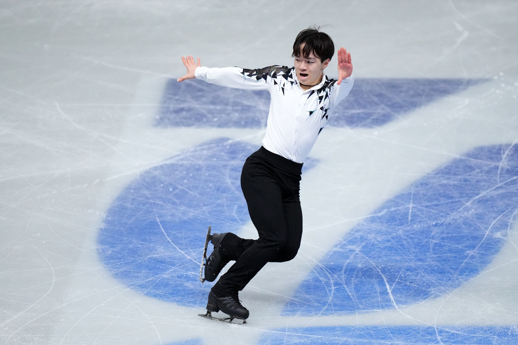Yuma Kagiyama, of Japan, competes in the men's short program segment at the ISU Grand Prix of Figure Skating Final in Nagoya, central Japan, Thursday, Dec. 4, 2025. (AP Photo/Hiro Komae)