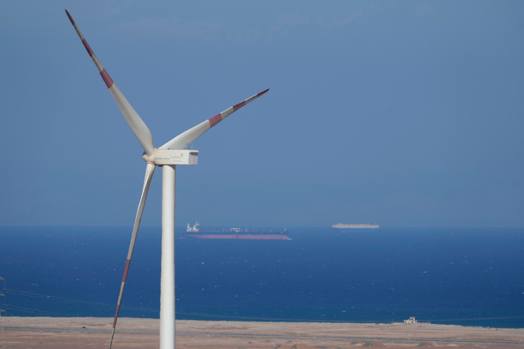 FILE - Cargo ships sail past Lekela wind power station near the Red Sea city of Ras Ghareb, Egypt, Oct. 12, 2022. (AP Photo/Amr Nabil, File)